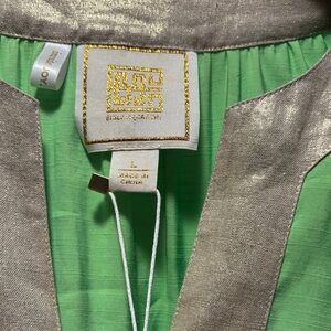 Vibrant Green Top with Metallic Accents